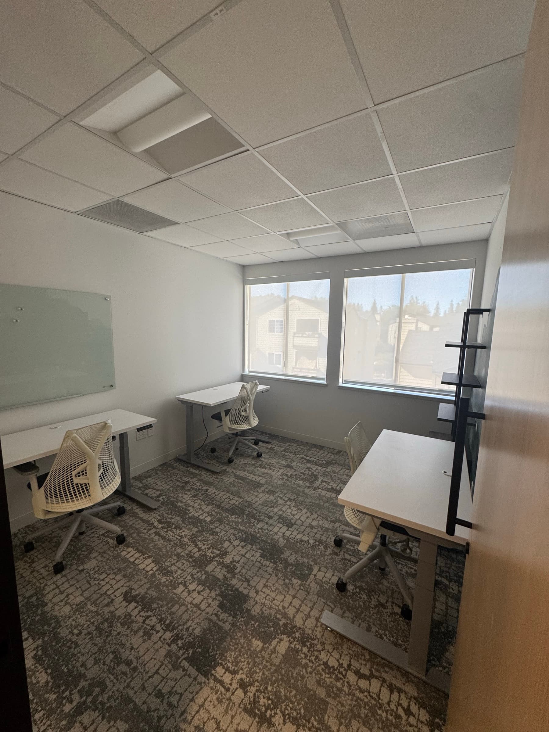 Three-person suite with standing desks